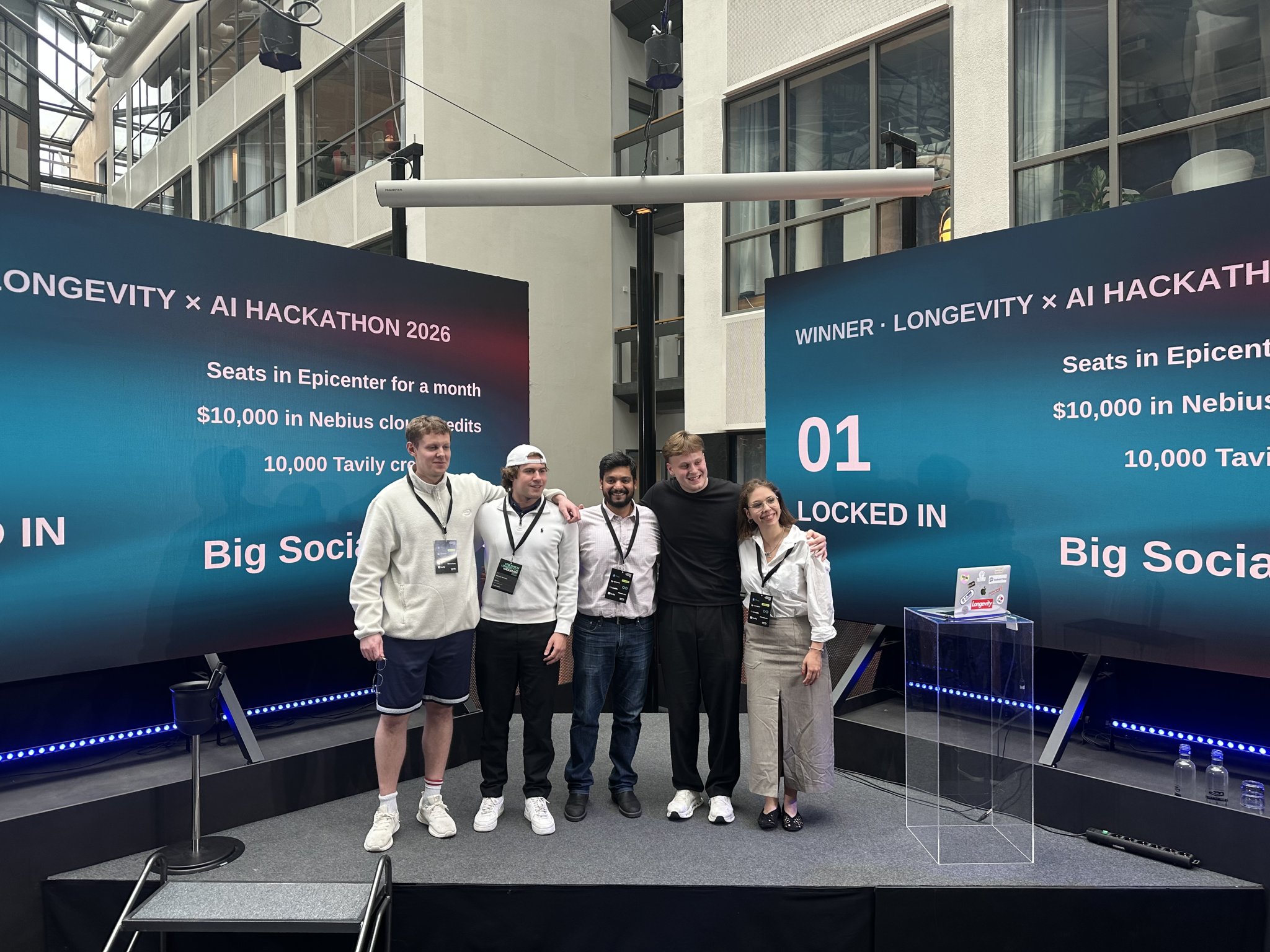 Team LockedIn on stage after winning the hackathon.